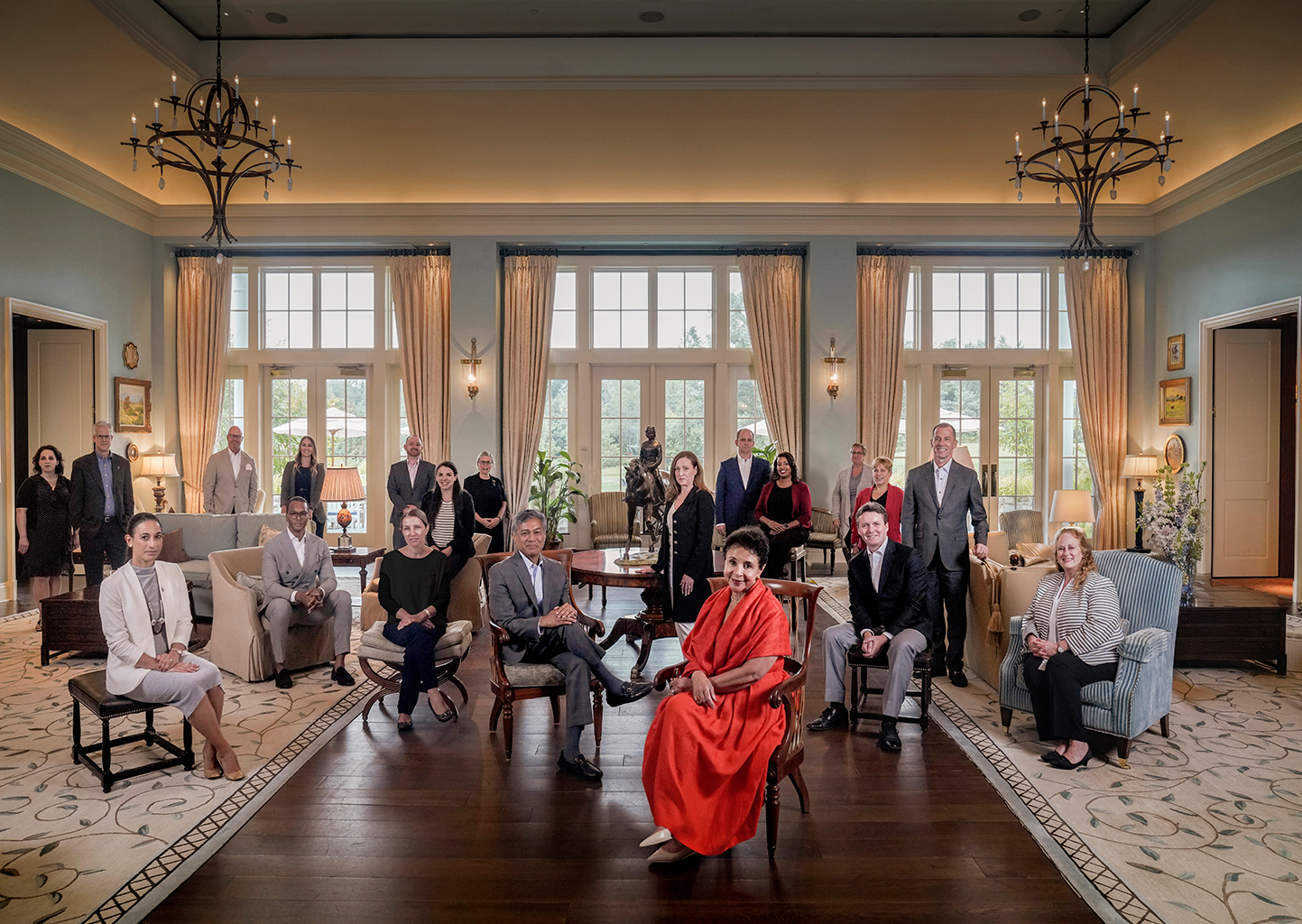 Salamander Collection corporate group indoors with Sheila Johnson in the center