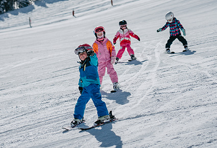 Kids skiing in Aspen, CO